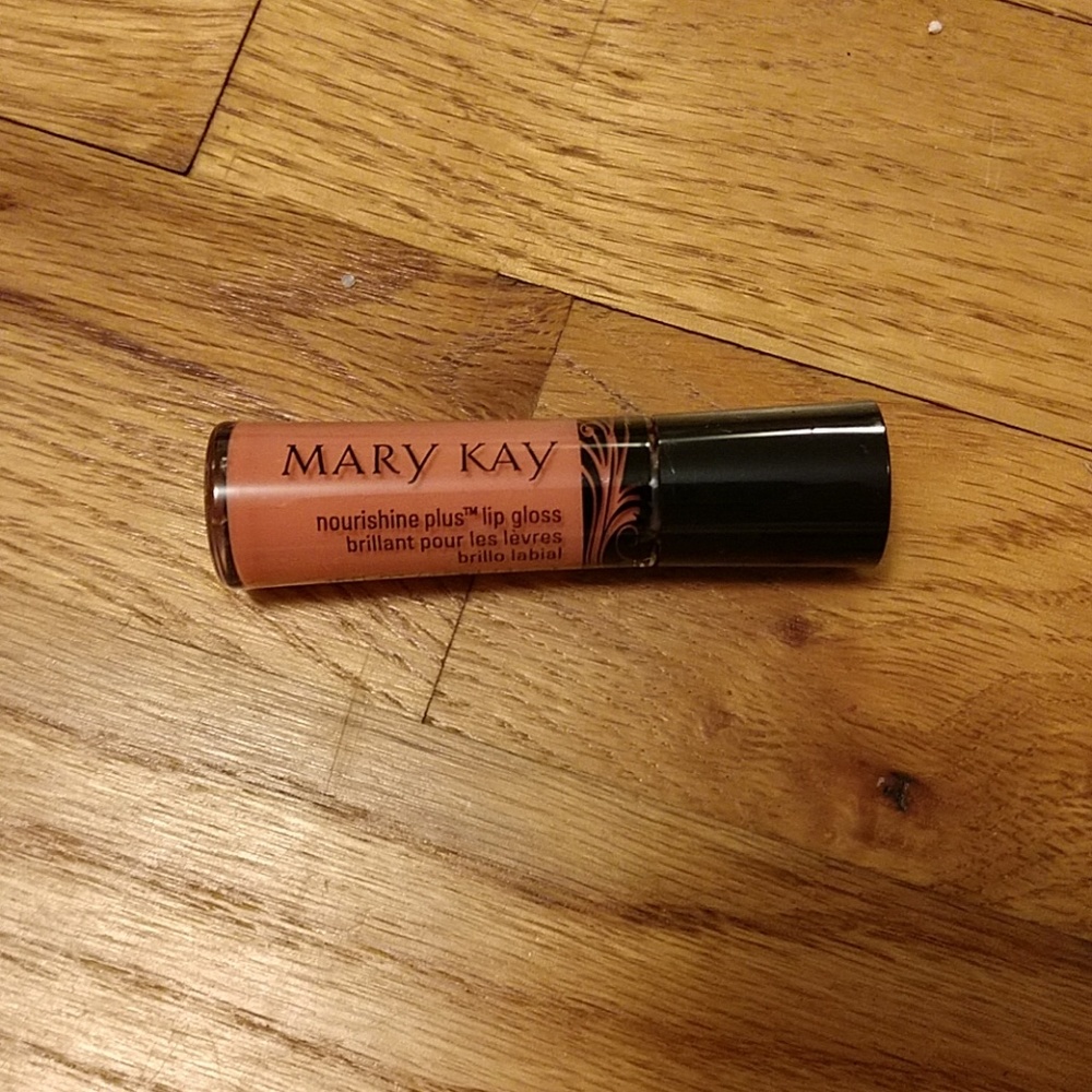 Sun blossoms nourishine plus lip gloss